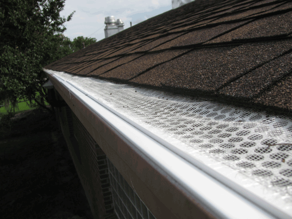 Top view of gutter closed in by screened top