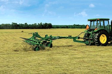 A hay tedder, which disperses forage across the field so it can dry more quickly.