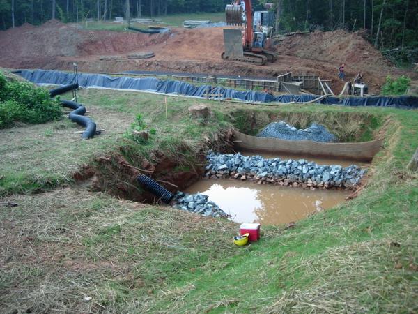 A stilling basin on a construction site.
