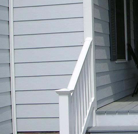 A house with Hardiplank siding and PVC trim and porch rails
