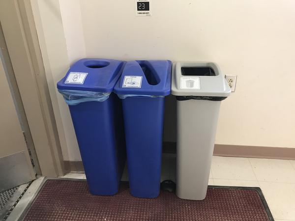 Trash cans with open lids