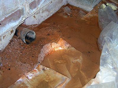 Figure 10. Standing water in a crawlspace.