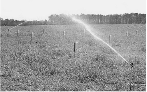 black and white photo of sprinkler irrigation system