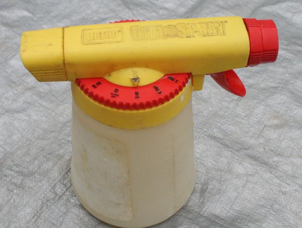 yellow and red hose-end sprayer