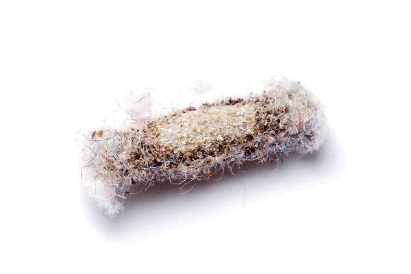 Enlarged rectangular casing with fuzzy, multicolored fibers