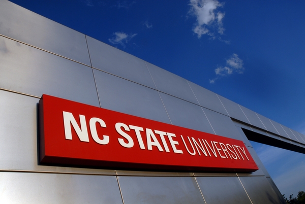 NC State University logo on the side of a building.