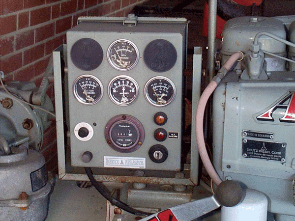 A panel of gauges on a diesel pump.