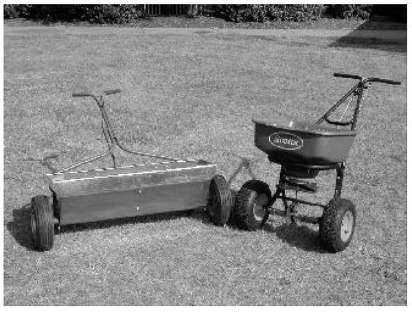 Black and white photo of drop spreader and rotary spreader