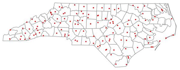 Unlabeled NC map with counties and red dots for stations