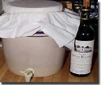 Large spigoted drink crock with cloth cover