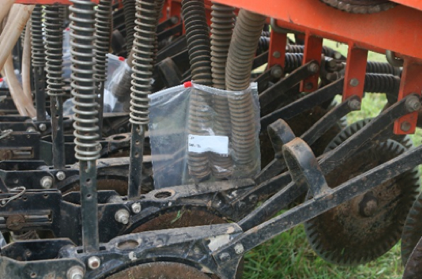 Figure 1. Collection bags attached at the bottom of the seed tub