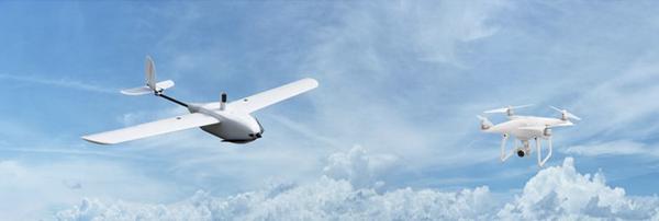 Photo of a fixed-wing (left) and rotary-wing (right) UAV