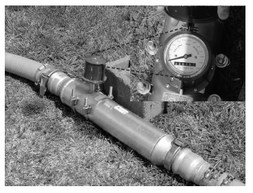 black and white photo of in-line flow meter