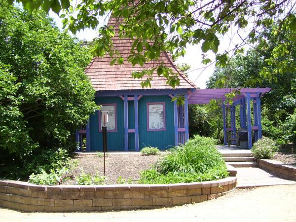 colorful blue and purple building is a focal point