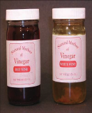 Two jars labeled Red Wine and White Wine Mother of Vinegar